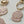 A close up side view of pink glitter pearl keyring gift for muslim girls