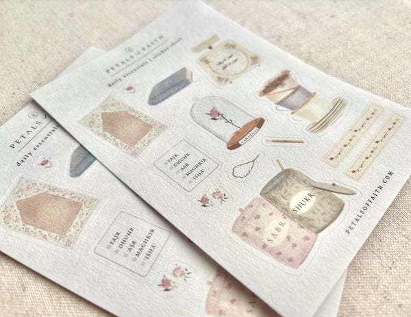 Islamic A6 sticker heet featuring prayer mat, Quran, miswak, salah checklist, sabr & shukr jars and tawakkul floral design (view from side)