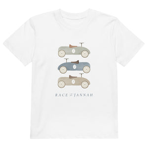 Front view of Race to Jannah boys Islamic t-shirt with vintage toy car design on white organic cotton